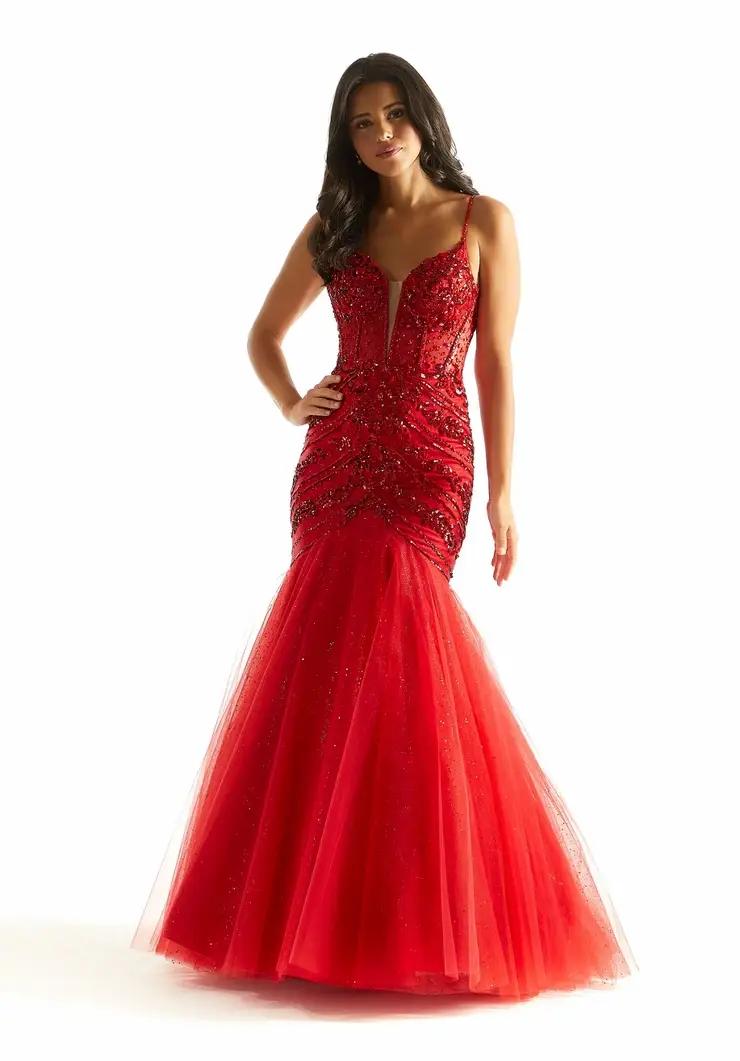 Model wearing a red dress by morilee