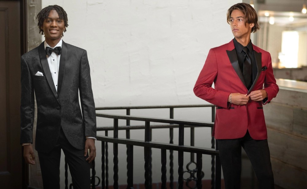 Men wearing black and red tuxedos.